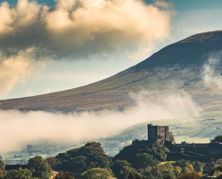 spooky walks - Brick fort below Pendle Hill, Lancashire with low clouds