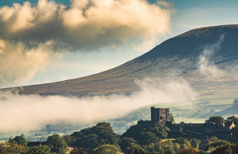 spooky walks - Brick fort below Pendle Hill, Lancashire with low clouds